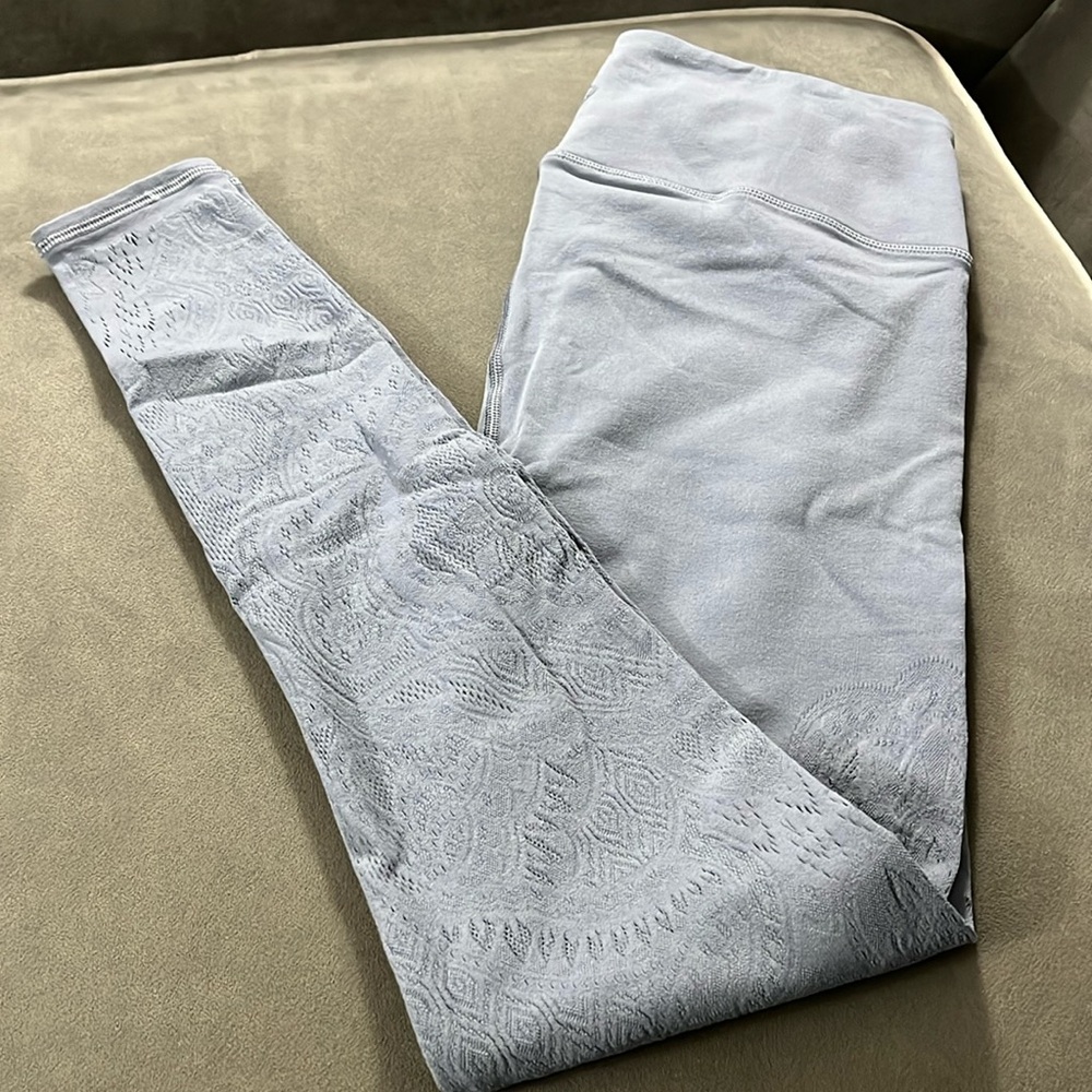 Lululemon 8 leggings Lacey throughout the legs  grayish lavender pocket inside